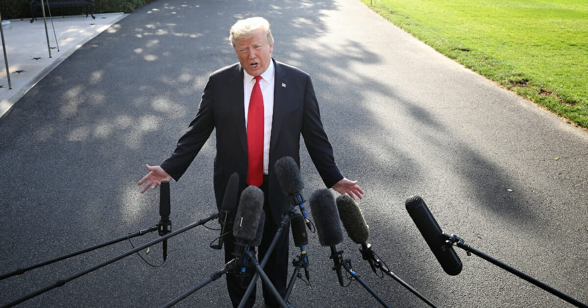 President Donald Trump answers questions while departing the White House on May 30, 2019. (Win McNamee / Getty Images)