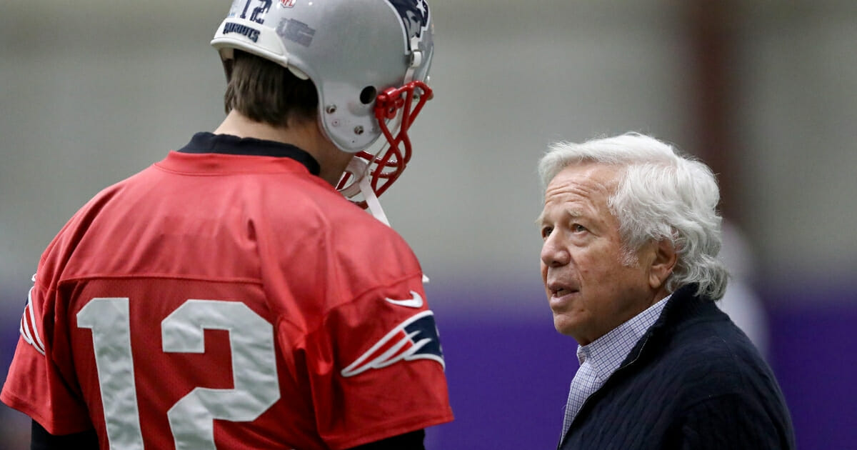 New England Patriots owner Robert Kraft, right, with quarterback Tom Brady.