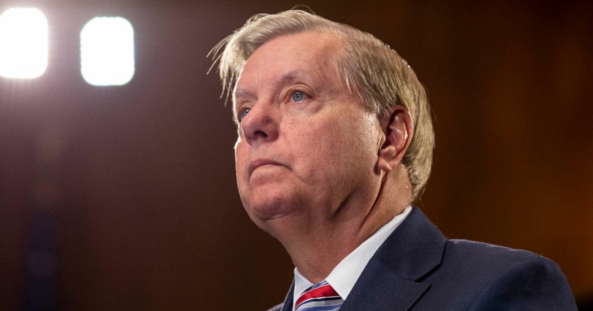 Sen. Lindsey Graham listens at a news conference proposing legislation to address the crisis at the southern border on May 15, 2019, in Washington, D.C.