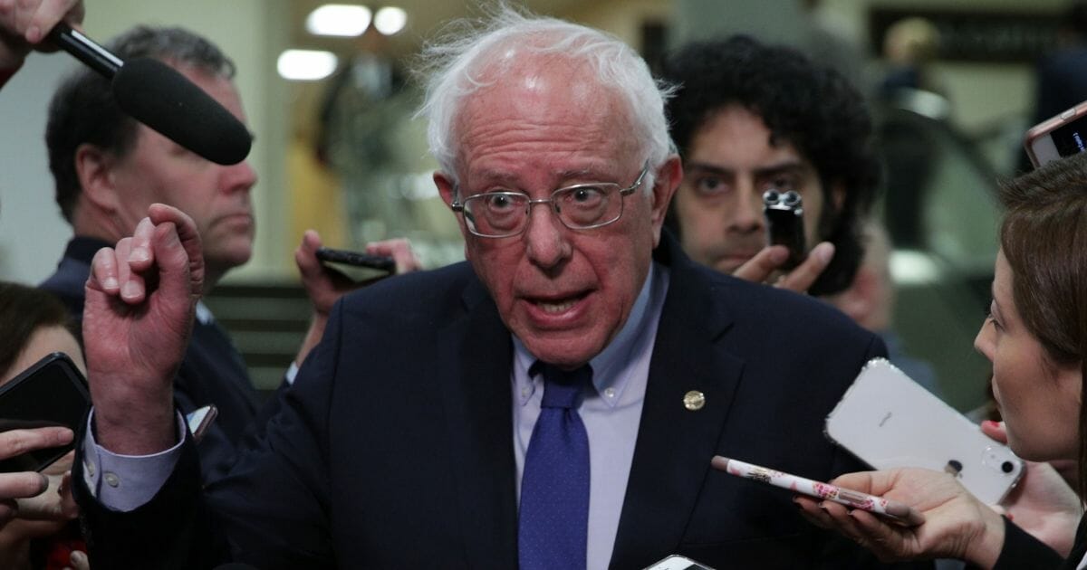 Sen. Bernie Sanders speaks to members of the media after a closed briefing for Senate members May 21, 2019, on Capitol Hill in Washington, D.C.