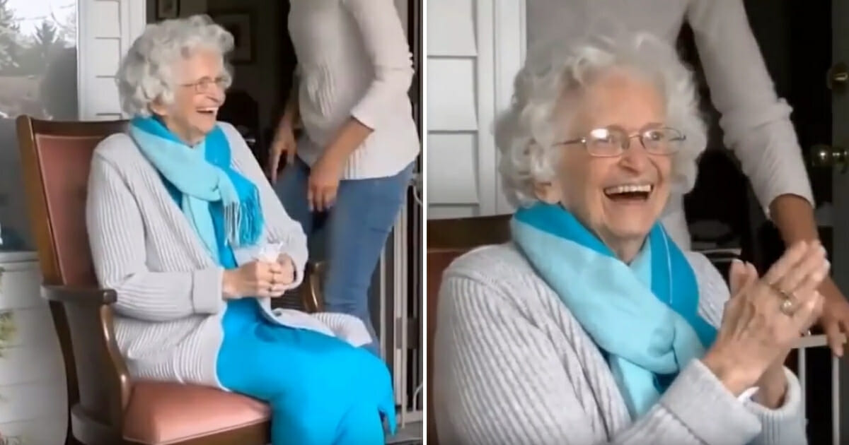 Tinney Davidson waves at students.