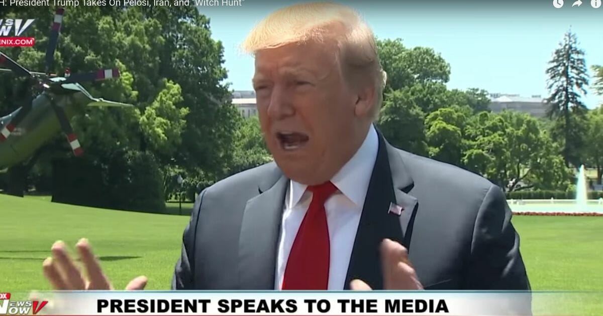 President Donald Trump addresses reporters outside the White House on Friday, May 24, 2019.