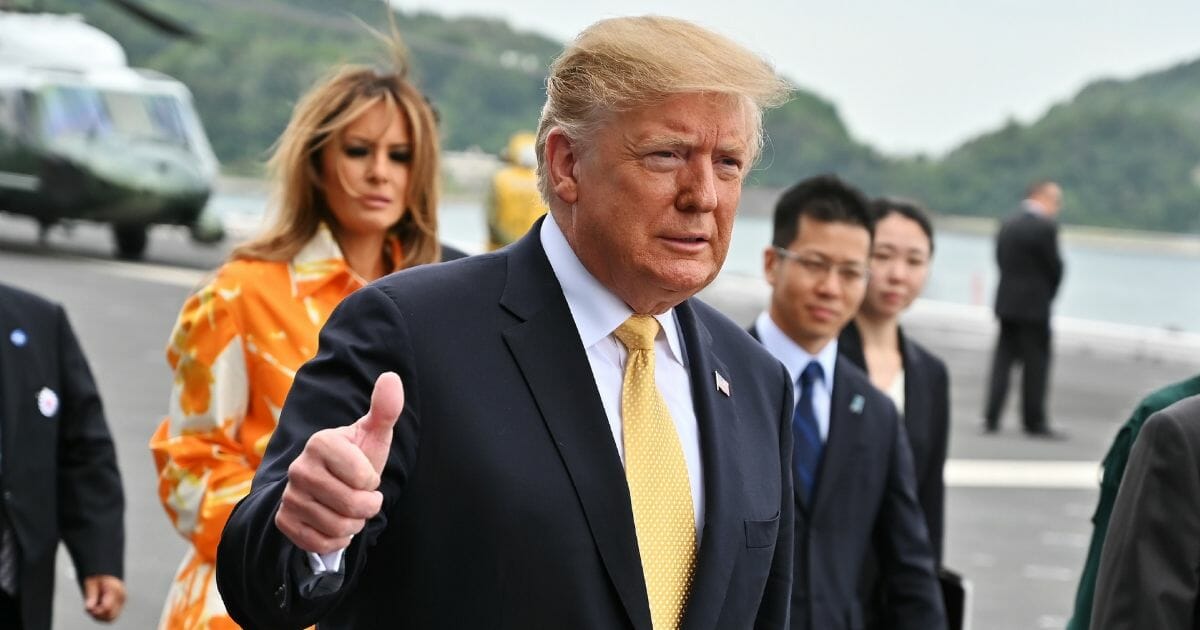 President Donald Trump gestures on Tuesday, May 28, 2019, in Yokosuka, Kanagawa, Japan.