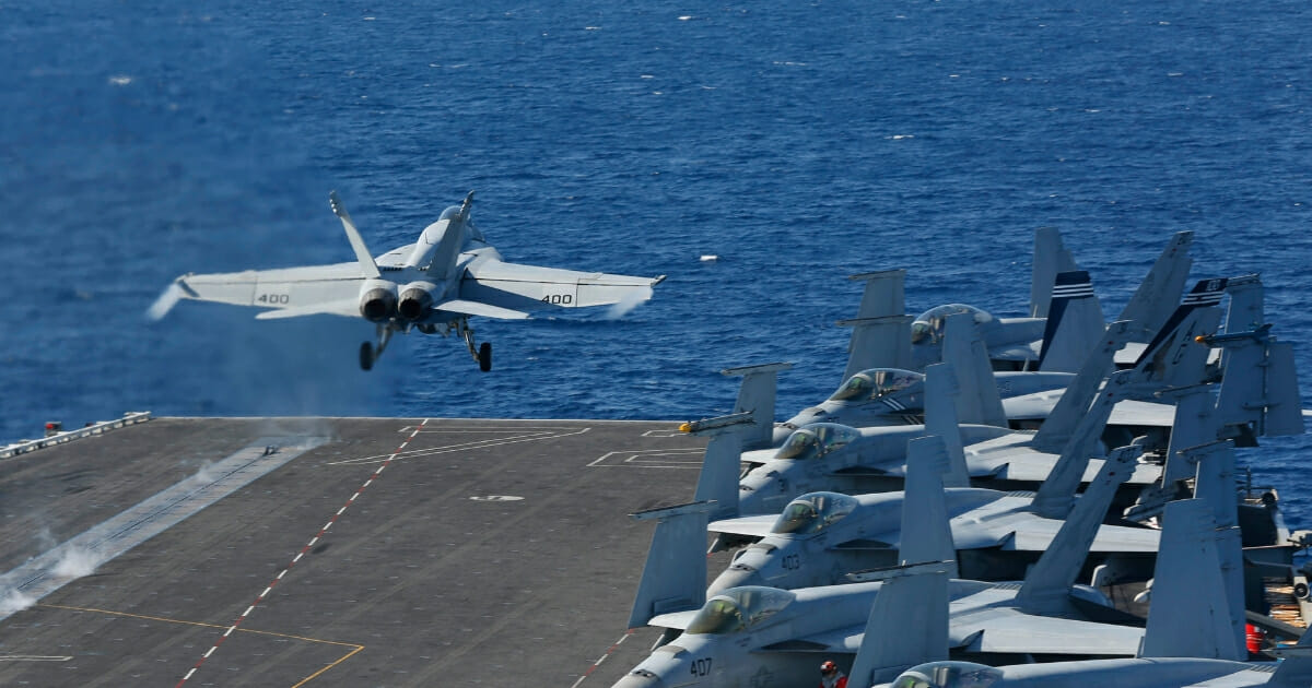 An F/A-18E Super Hornet launches from the flight deck of the USS Abraham Lincoln in a May 3 photo released by the U.S. Navy.
