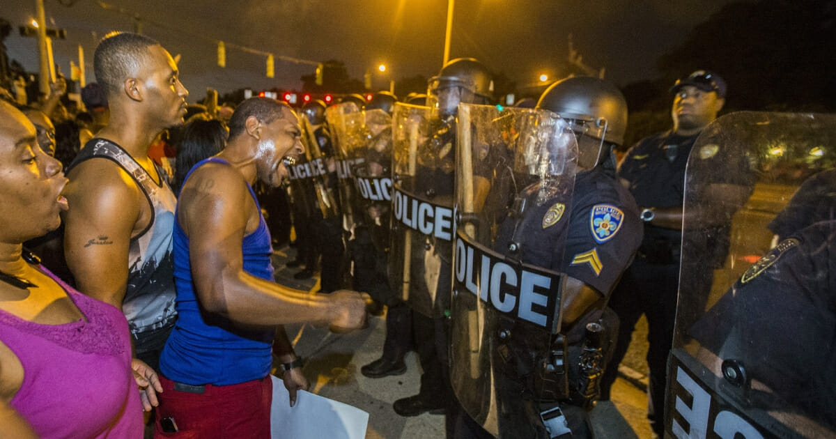 Police officers square off against Black Lives Matter protesters in Baton Rouge, Louisiana, in July 2016.