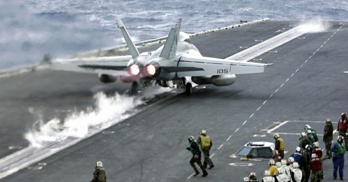 An F-18 Super Hornet is launched from the deck of the US Navy carrier USS Abraham Lincoln during the Foal Eagle exercises off South Korea in March 2006.