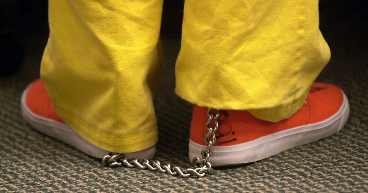 shackled shoes of a prison inmate