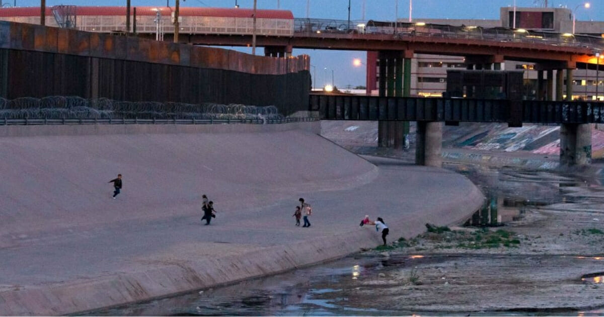 Immigrants cross the Rio Grande between Ciudad Juarez, Mexico and El Paso, Texas.