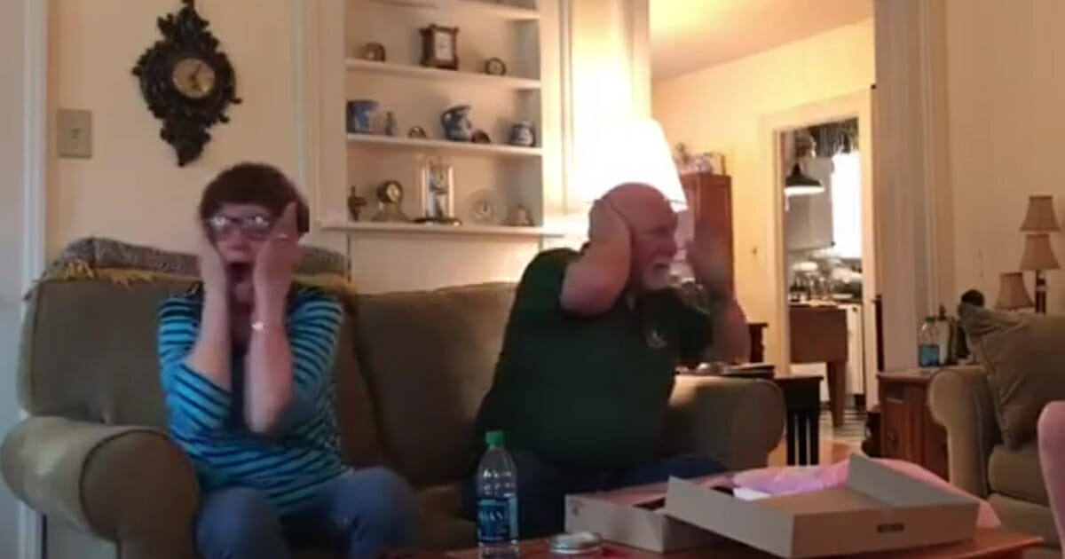 Parents screaming of excitement.