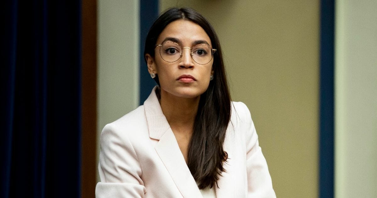 Rep. Alexandria Ocasio-Cortez arrives to a House Civil Rights and Civil Liberties Subcommittee hearing on confronting white supremacy at the U.S. Capitol on May 15, 2019, in Washington, D.C.
