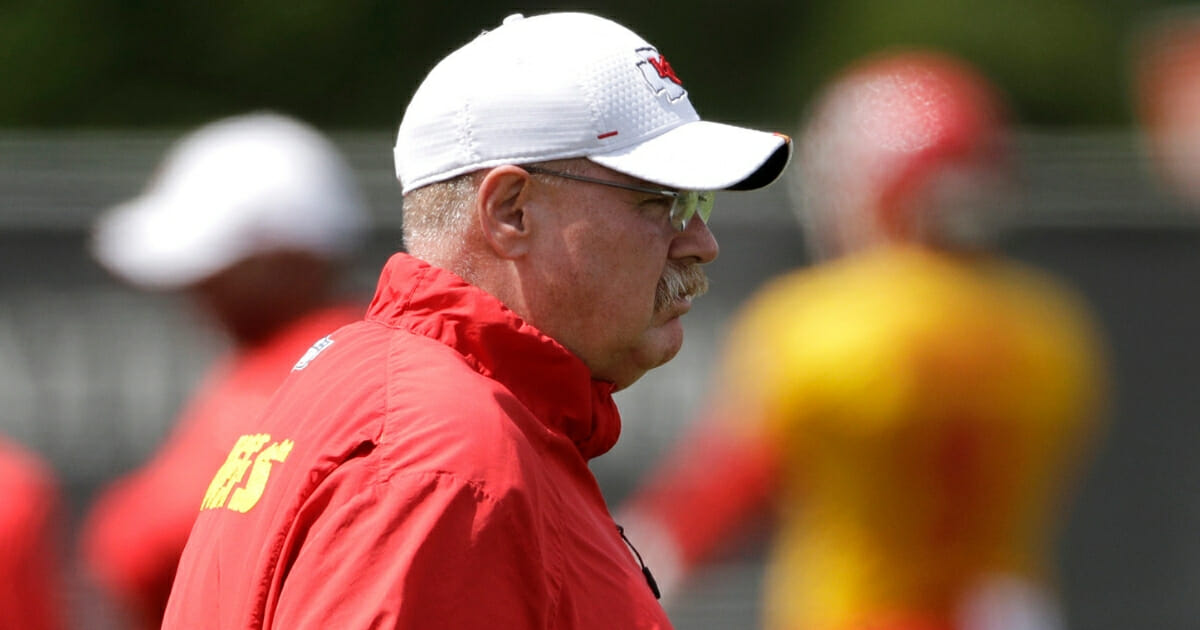 Kansas City Chiefs head coach Andy Reid watches a workout at the team's training facility.