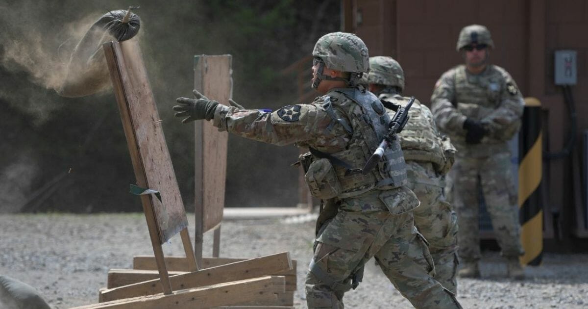 Members of KATUSA, the Korean Augmentation to the United States Army, take part in an annual best warrior competition at the U.S. Army's Rodriguez shooting range on April 16, 2019.