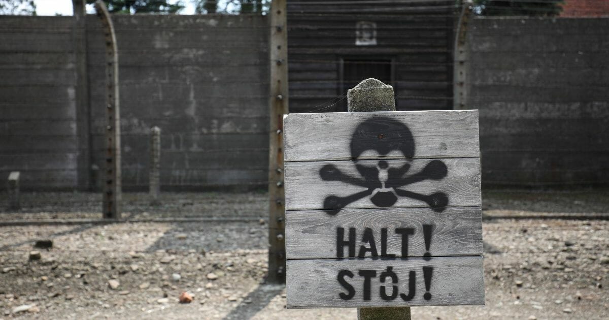 A sign outside the Auschwitz-Birkenau Memorial and Museum in Oswiecim, Poland.