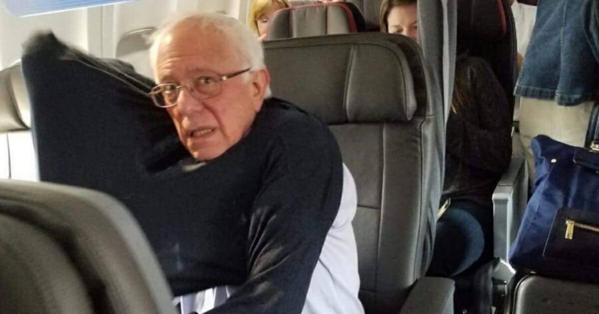 Sen. Bernie Sanders is photographed on a flight.