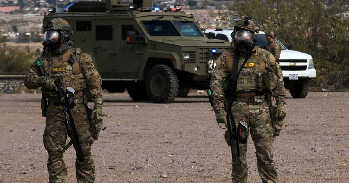 Members of the U.S. border patrol take part in a drill in Sundland Park, United States, on Nov. 30, 2018, as seen from Ciudad Juarez, in the Mexico-U.S. border.