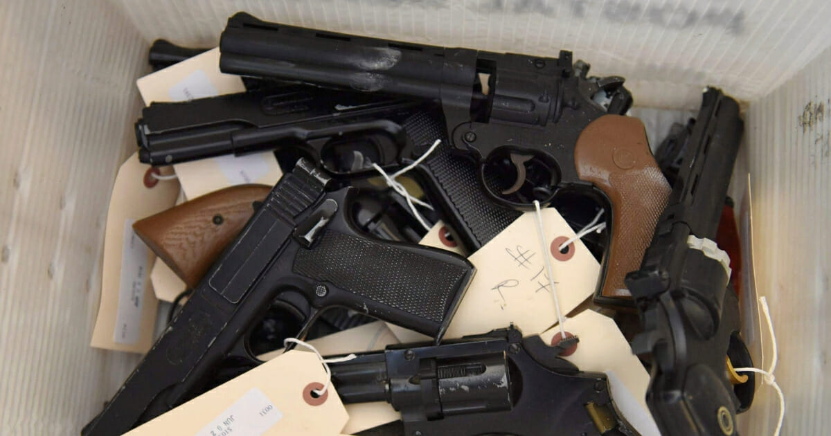 The Chicago Police Department displays firearms collected in a gun buy-back program