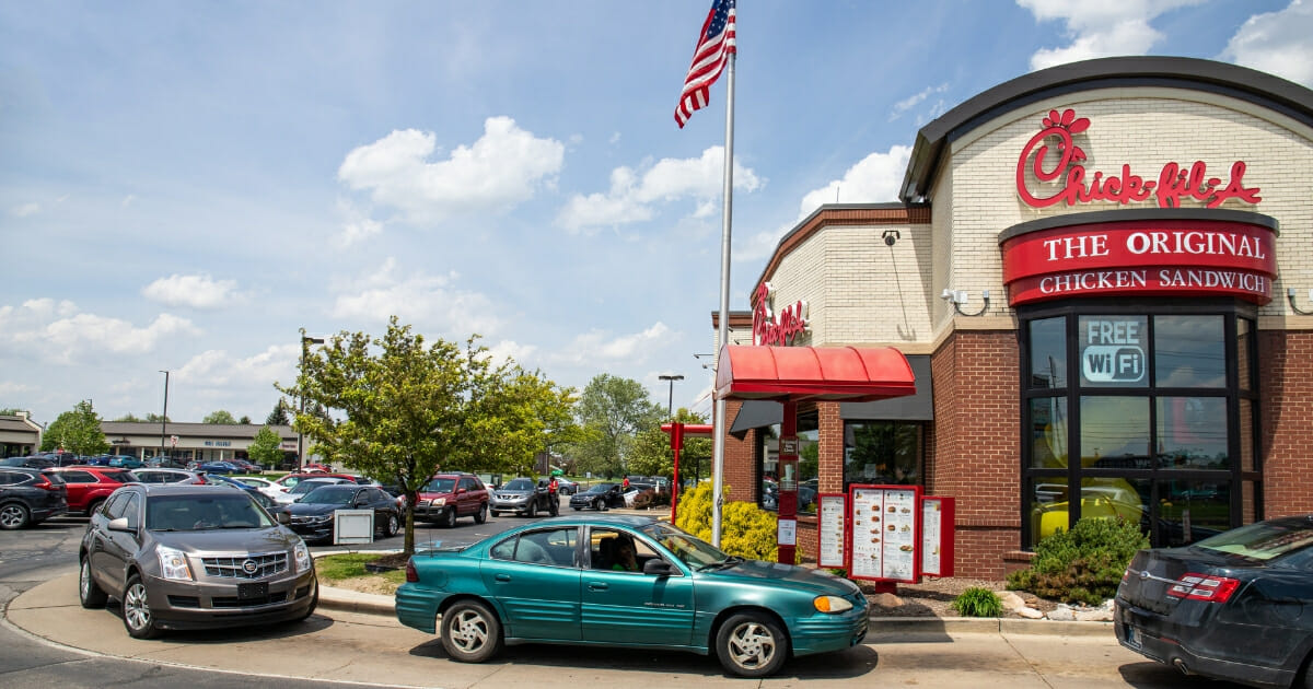 Cars line up at the drive-thru of a Chick-fil-A in Indianapolis.