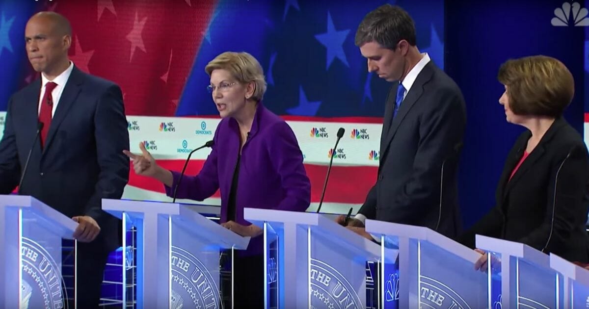 Democratic presidential hopefuls, from left: Cory Booker, Elizabeth Warren, Beto O'Rourke, and Amy Klobuchar on stage during Wednesday night's debate.