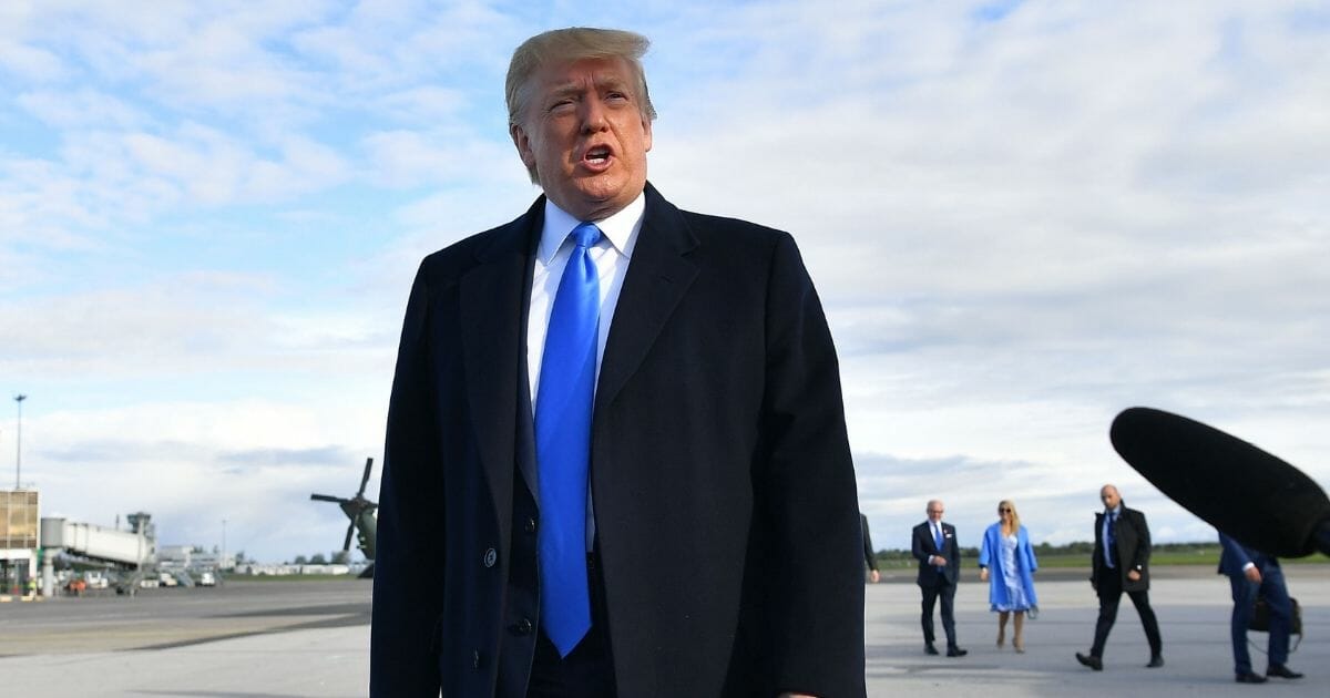 President Donald Trump speaks to media before boarding Air Force One at Shannon Airport in Shannon, Ireland, on June 6, 2019.