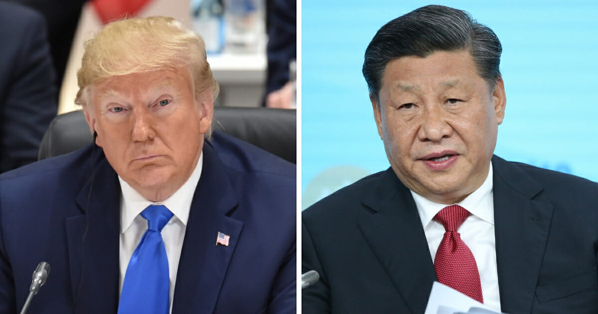 President Donald Trump, left, announced after a meeting with Chinese President Xi Jinping, right, that trade talks with China will resume as he holds off -- for now -- on a $300 billion batch of tariffs Trump had threatened to impose on Chinese products.