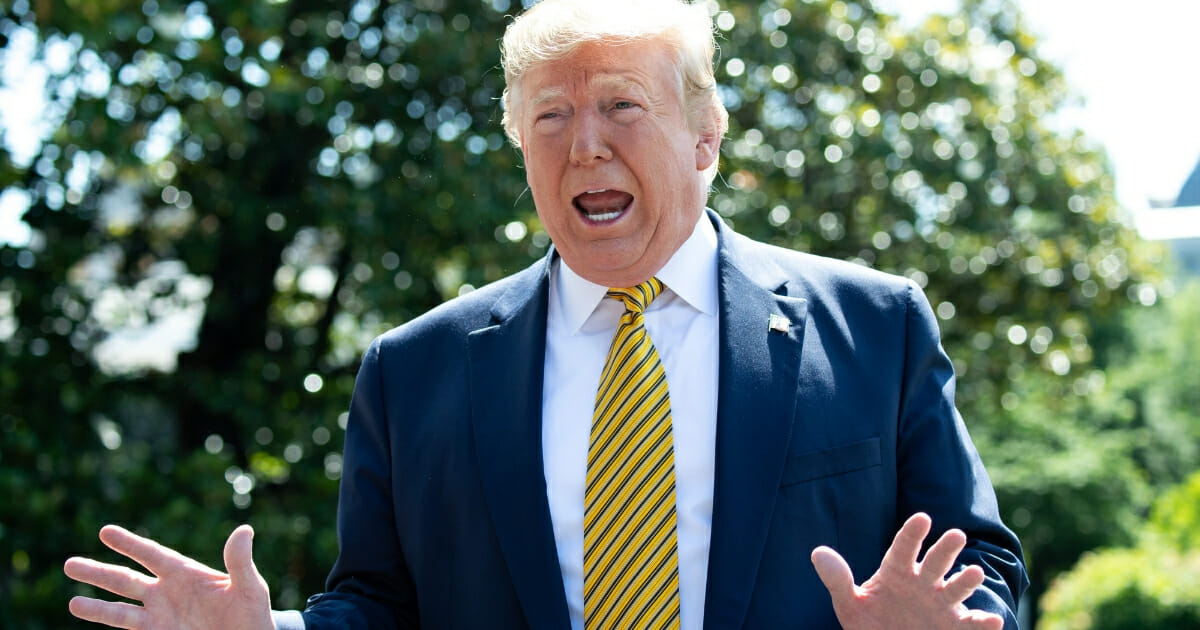 President Donald Trump speaks to the media prior to departing on Marine One from the South Lawn of the White House in Washington, D.C., on June 22, 2019, as he travels to Camp David, Maryland.