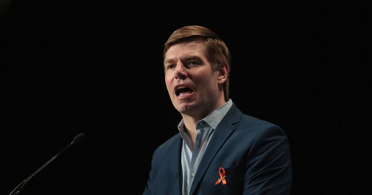 Democratic presidential candidate Congressman Eric Swalwell (D-Calif.) speaks at the Iowa Democratic Party's Hall of Fame Dinner on June 9, 2019, in Cedar Rapids, Iowa.