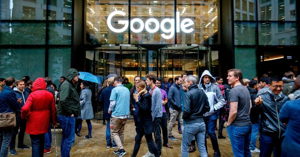 Google staff stage a walkout at the company's UK headquarters in London on Nov. 1, 2018, as part of a global campaign over the U.S. tech giant's handling of sexual harassment.
