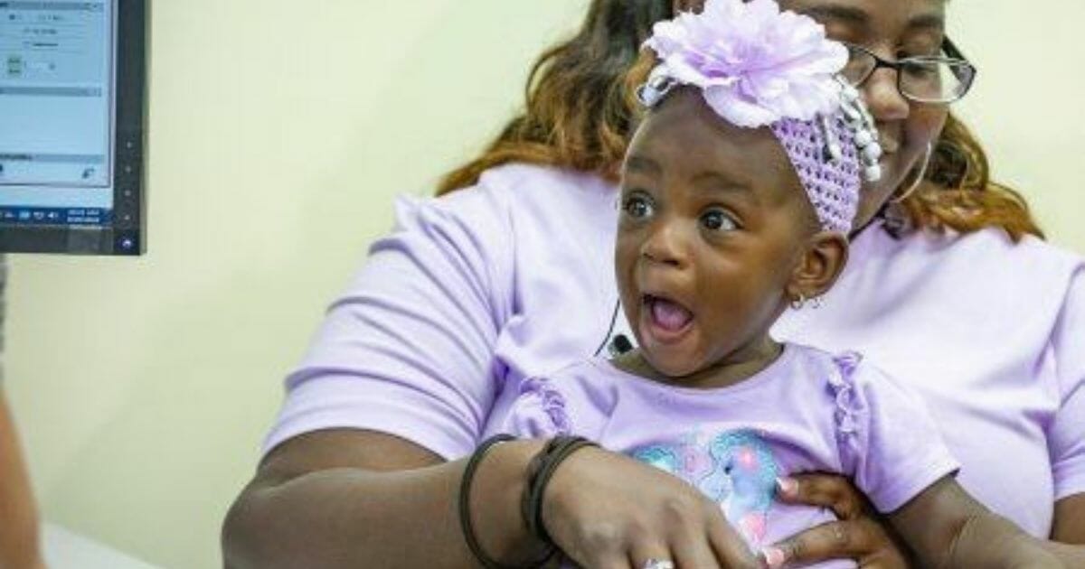 Little girl hears for first time