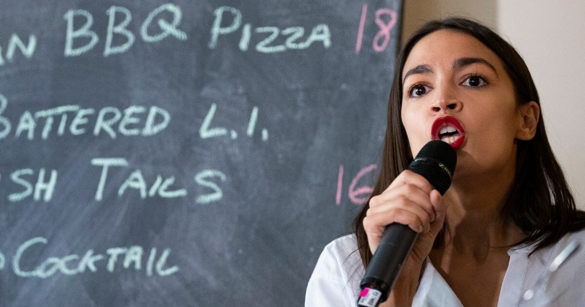 Rep. Alexandria Ocasio-Cortez speaks to supporters and employees at the Queensboro Restaurant on May 31, 2019, in New York City.