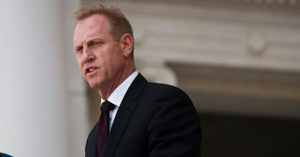 Acting Secretary of Defense Patrick Shanahan delivers remarks during a Memorial Day ceremony at Arlington National Cemetery on May 27, 2019 in Arlington, Virginia.