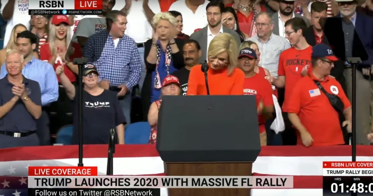 President Donald Trump's spiritual adviser, Paula White, is cheered during his 2020 campaign kickoff rally in Orlando, Fla., on Tuesday, June 18, 2019.