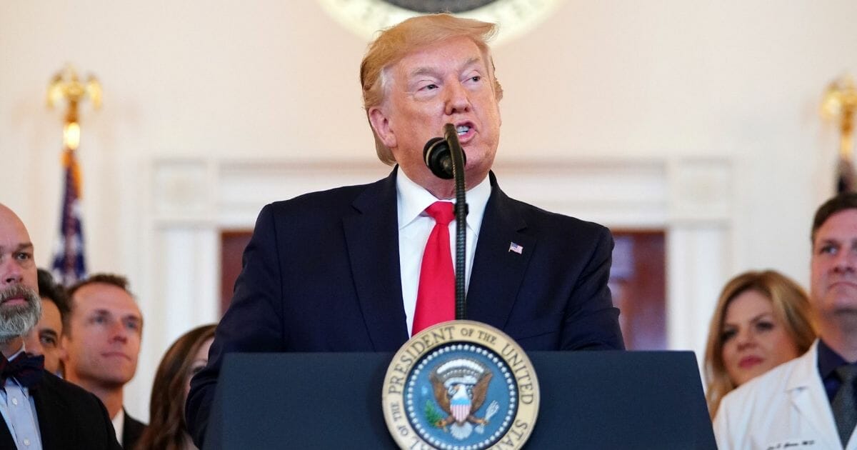 President Donald Trump speaks before signing an executive order in the Grand Foyer of the White House on Monday, June 24, 2019.