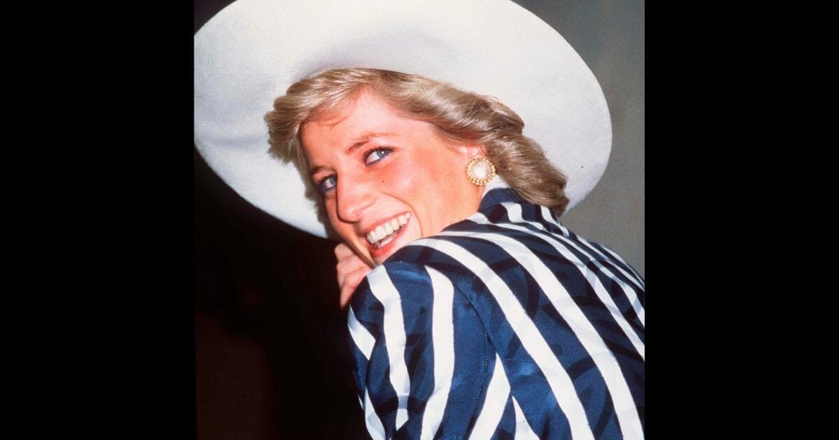 Princess Diana smiling into the camera.