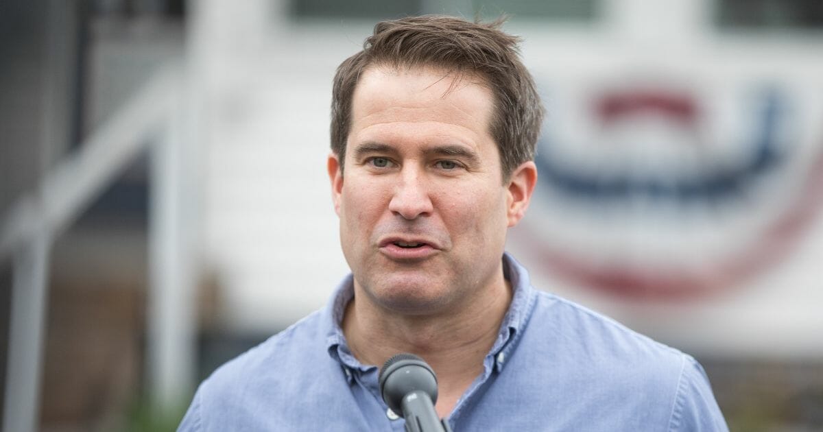 Democratic presidential candidate Rep. Seth Moulton speaks to reporters on April 23, 2019, in Manchester, N.H.