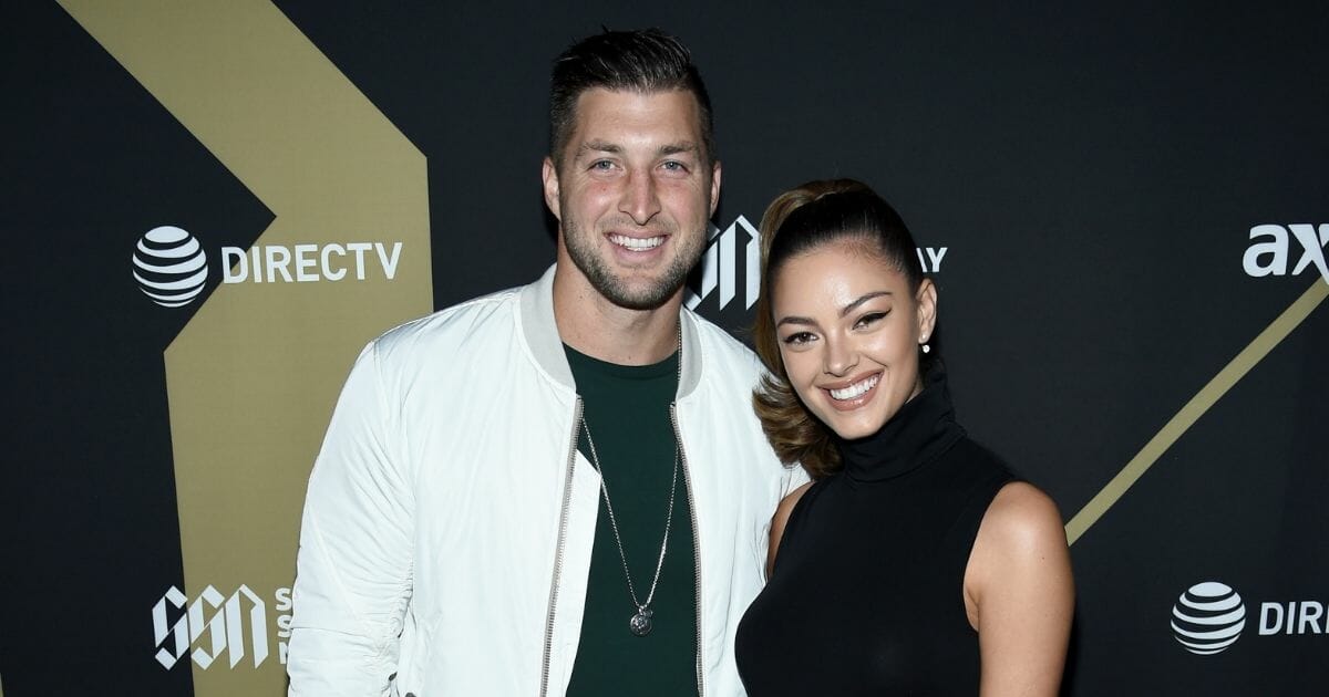 Tim Tebow and Demi-Leigh Nel-Peters attend DIRECTV Super Saturday Night 2019 at Atlantic Station on Feb. 2, 2019, in Atlanta, Georgia.