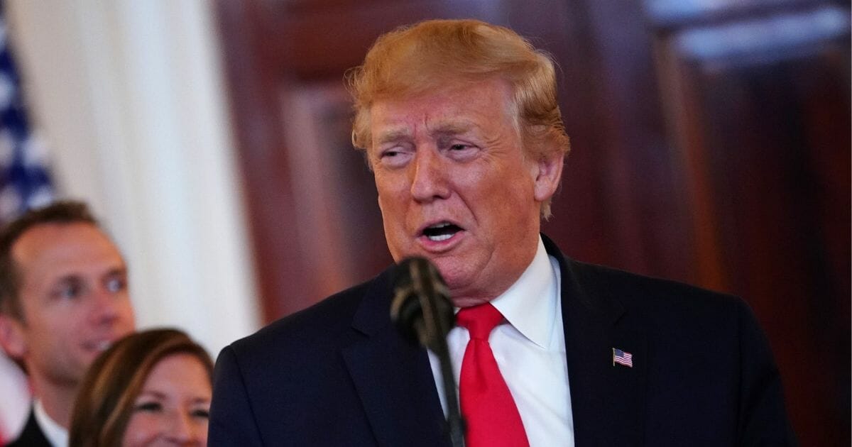 President Donald Trump speaks before signing an executive order in the Grand Foyer of the White House on June 24, 2019.