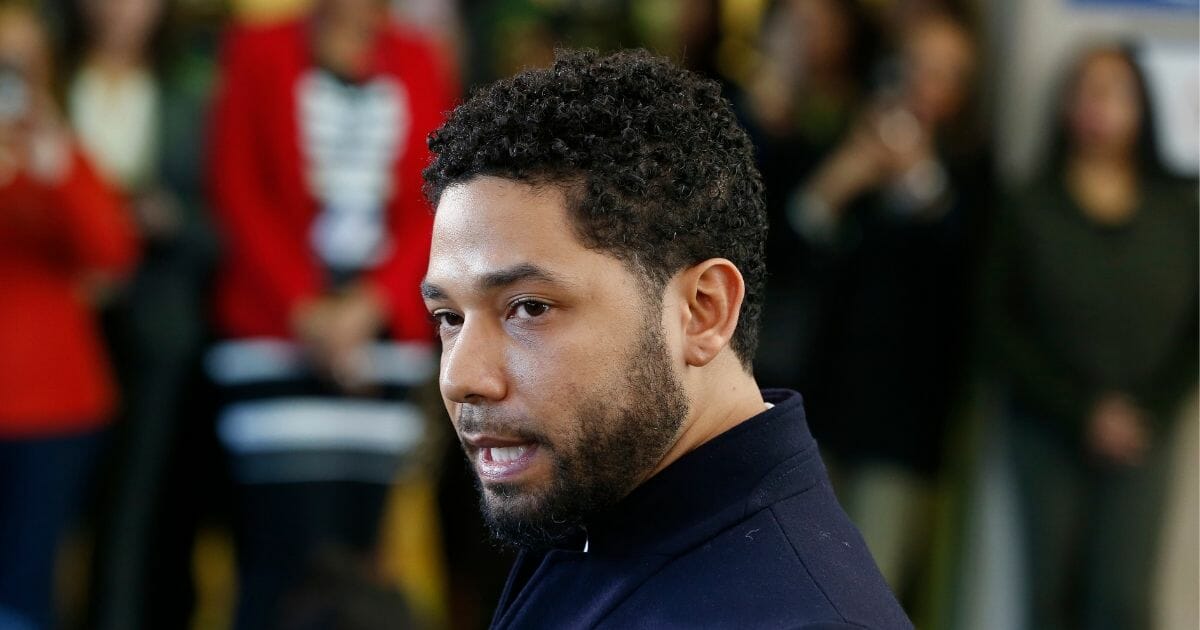 Actor Jussie Smollett appears outside the courtroom after hearing that charges against him have been dropped