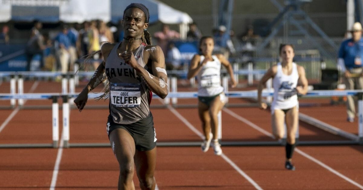 Cece Telfer, a transgender female track champion racing against competitors.