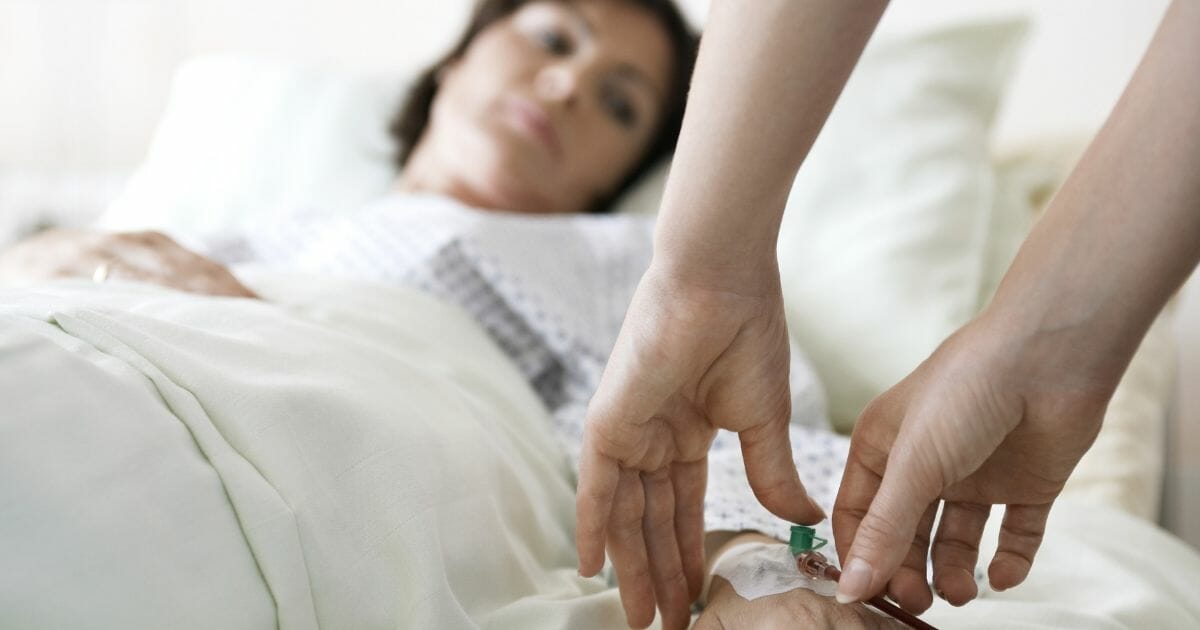 Woman in hospital bed