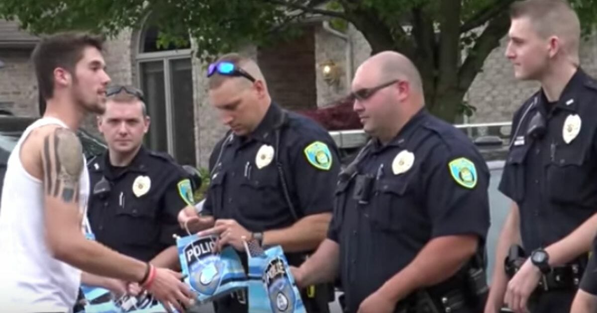 Police officers come to boy's graduation party