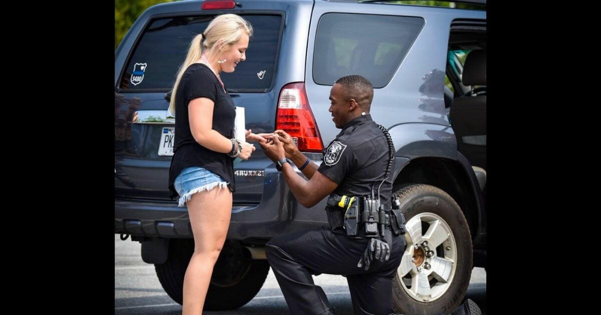 A police officer proposes to his girlfriend