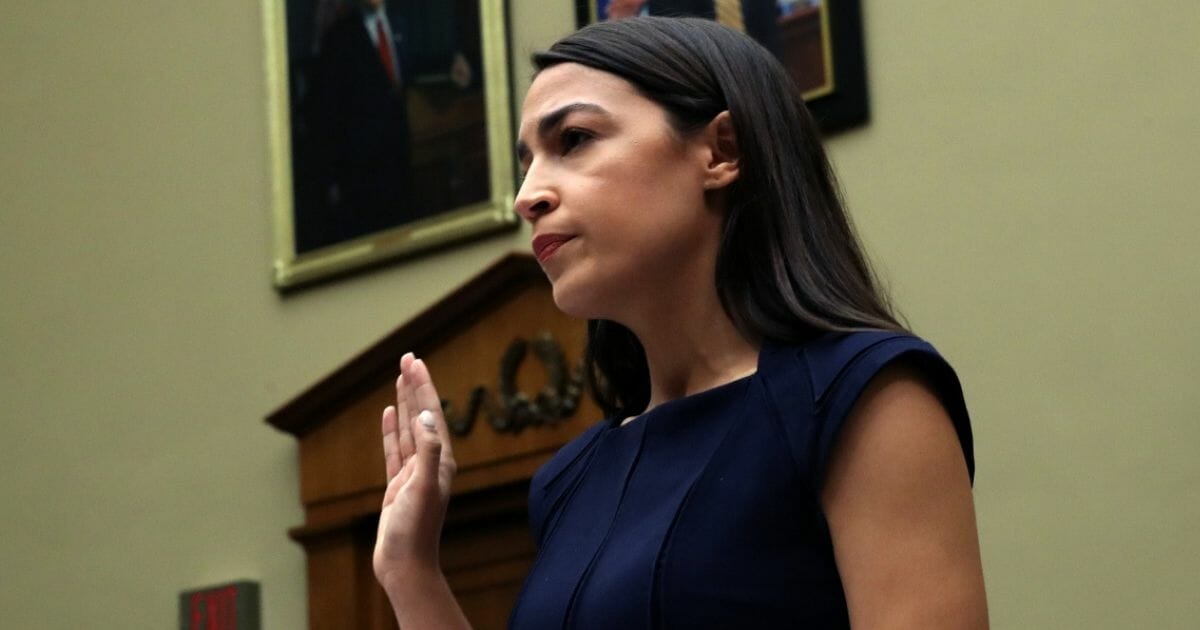 Rep. Alexandria Ocasio-Cortez attends a House Oversight and Reform Committee hearing on the separation of illegal immigrant children from their parents July 12, 2019, in Washington, D.C.