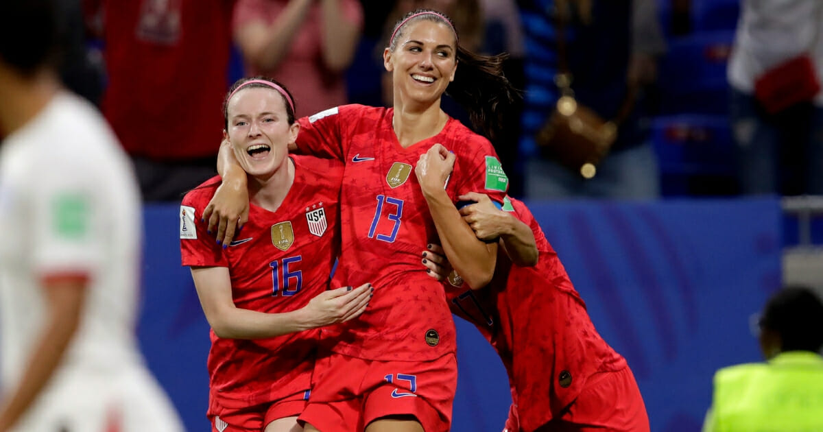 U.S. soccer star Alex Morgan celebrates with her teammates.