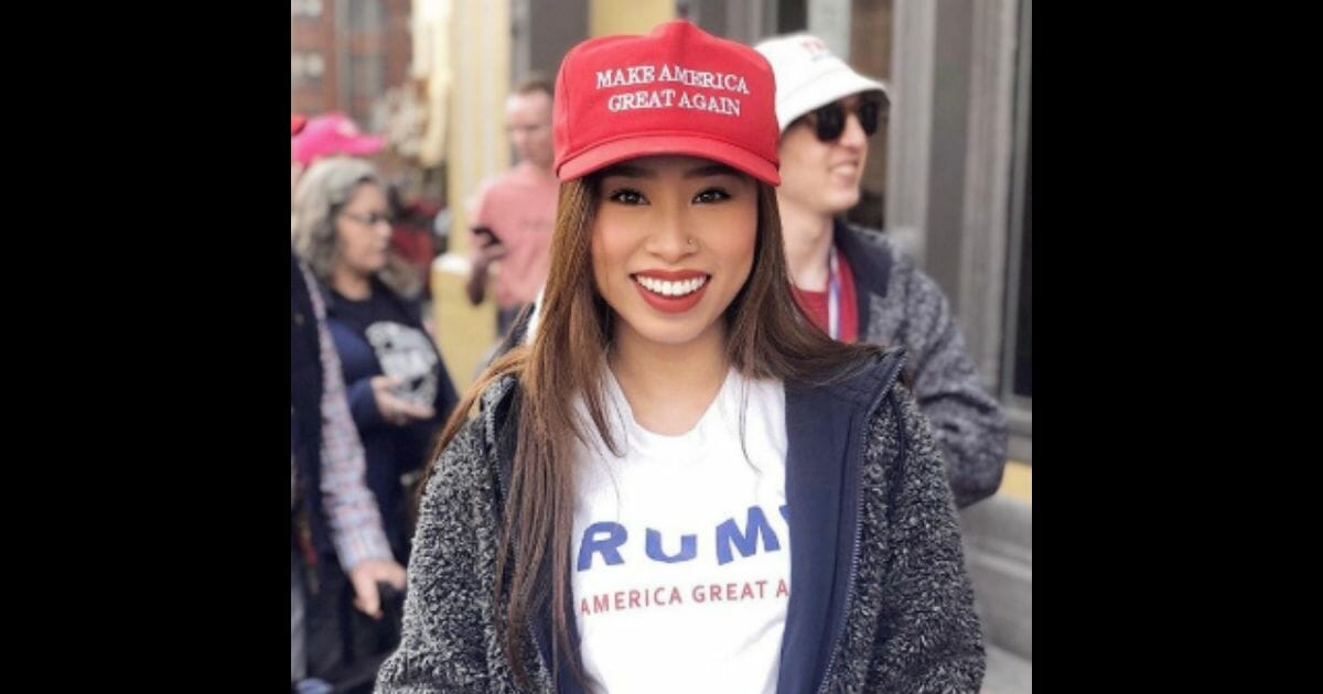 Beauty queen in a MAGA hat