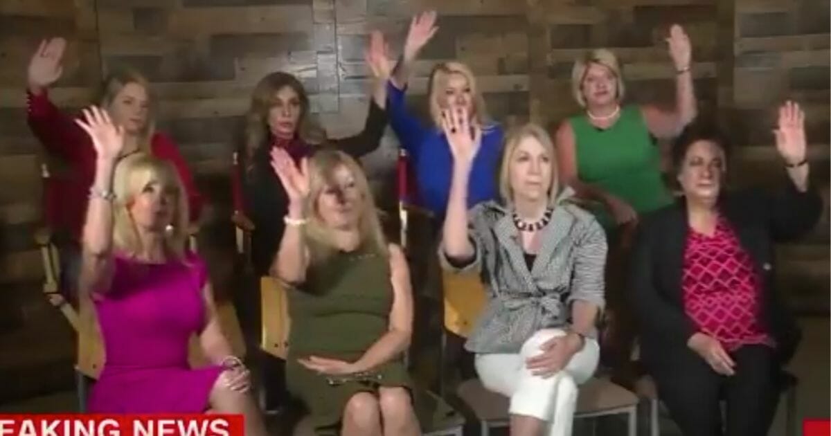 Eight supporters of President Donald Trump reacted Tuesday after CNN host Randi Kaye asked whether they thought Trump's Sunday tweets about four Democratic congresswomen weren't racist.