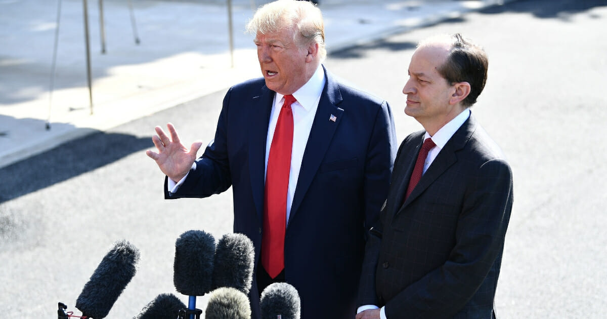 President Donald Trump and Labor Secretary Alexander Acosta speak to the media early July 12, 2019 at the White House in Washington, D.C.