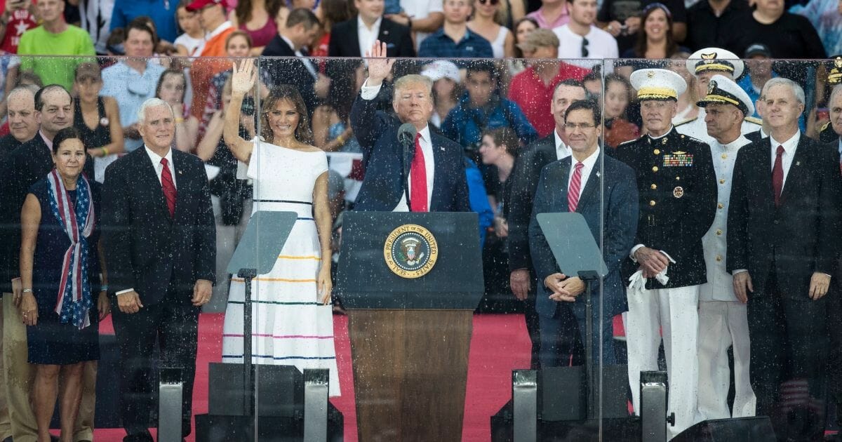 President Donald Trump, First Lady Melania Trump, Vice President Mike Pence and Second Lady Karen Pence stand on stage after President Donald Trump spoke at the "Salute to America" ceremony in front of the Lincoln Memorial, on July 4, 2019, in Washington, D.C.