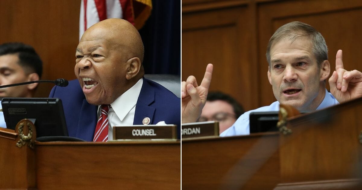 Reps. Elijah Cummings, left, and Jim Jordan, right, question acting Homeland Security Secretary Kevin McAleenana while he testifies before the House Oversight and Reform Committee on July 18, 2019, in Washington, D.C.
