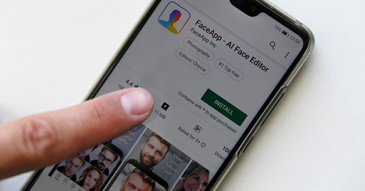 This illustration picture shows FaceApp application displayed on the screen of a smartphone. The chart-topping Russian-made application FaceApp, which allows millions of users to see how they will look as they age, finds itself in the eye of a political storm in the United States, with one senator urging an FBI investigation into its "national security and privacy risks."