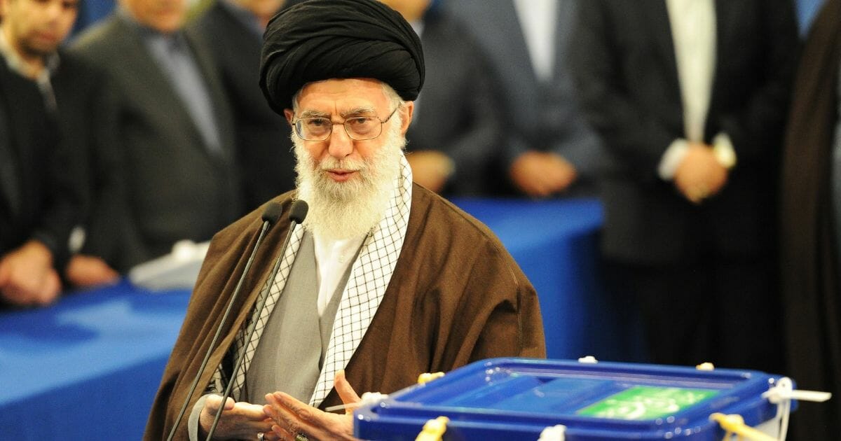 Iran's Supreme Leader Ayatollah Seyyed Ali Khamenei casts the first ballot in key elections Feb. 26, 2016, in Tehran.